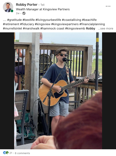 Boy Playing Guitar on Stage